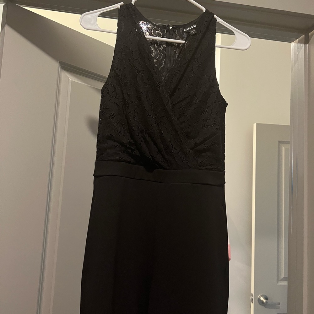 Black Express Pant Suit. All in one. Side pockets.
